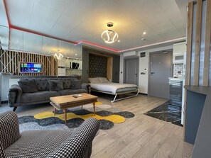 Premium Studio, City View | Individually furnished, blackout drapes, soundproofing