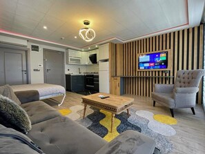 Deluxe-Apartment, Stadtblick | Wohnbereich