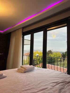 Deluxe Condo, City View | Individually furnished, blackout drapes, soundproofing