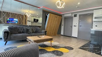 Deluxe Condo, City View | Living area