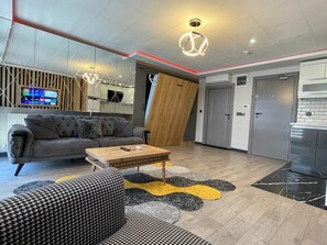 Deluxe-Apartment, Stadtblick | Wohnbereich