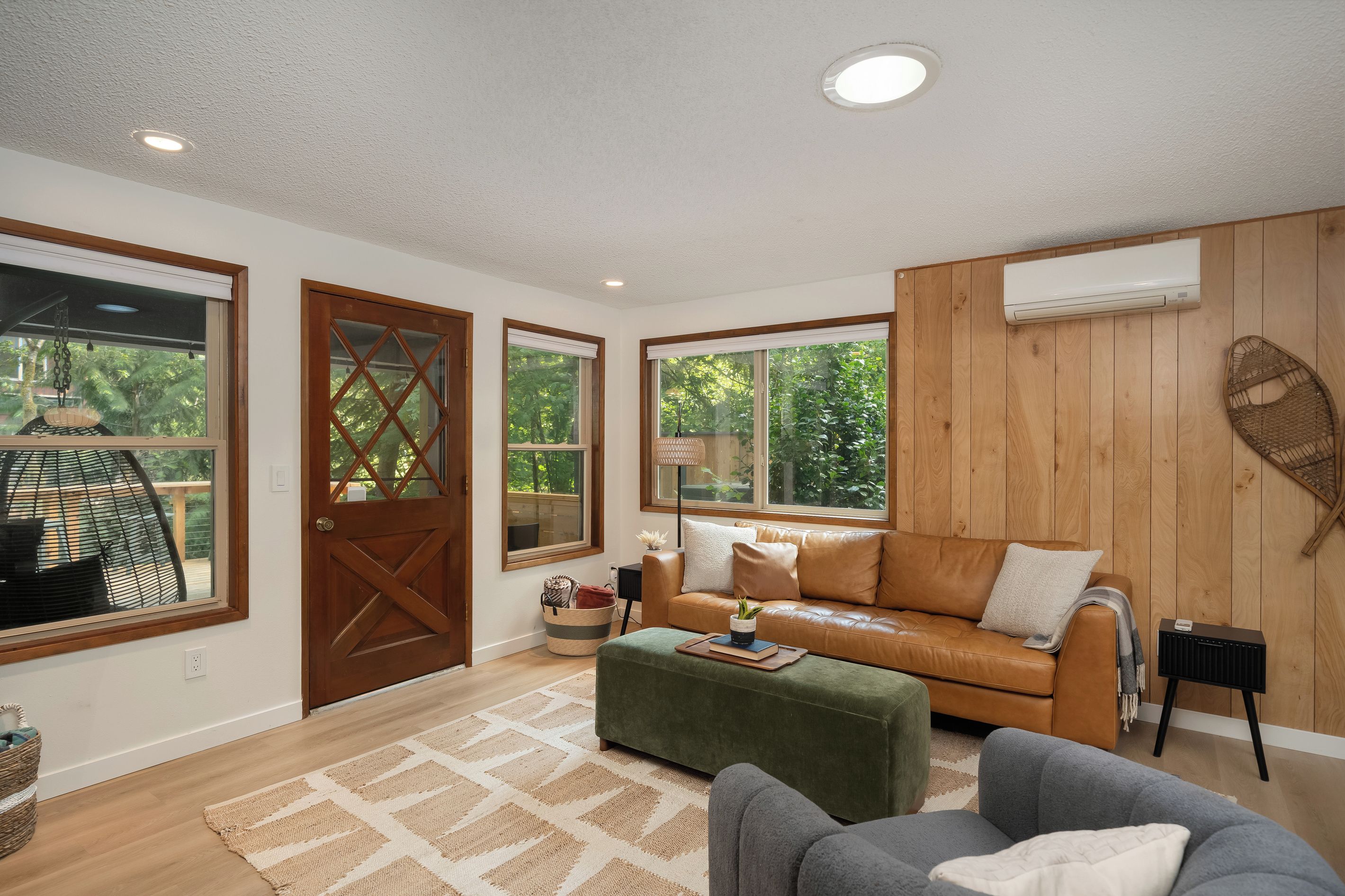 Sink into leather and let the wood-paneled walls set the retro-cabin mood.