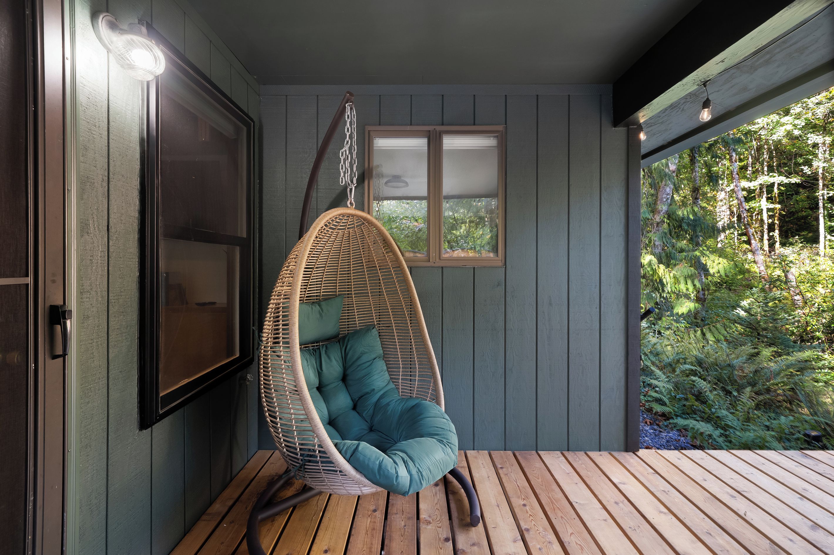 Curl up in the hanging chair with a book and let the forest do the rest.
