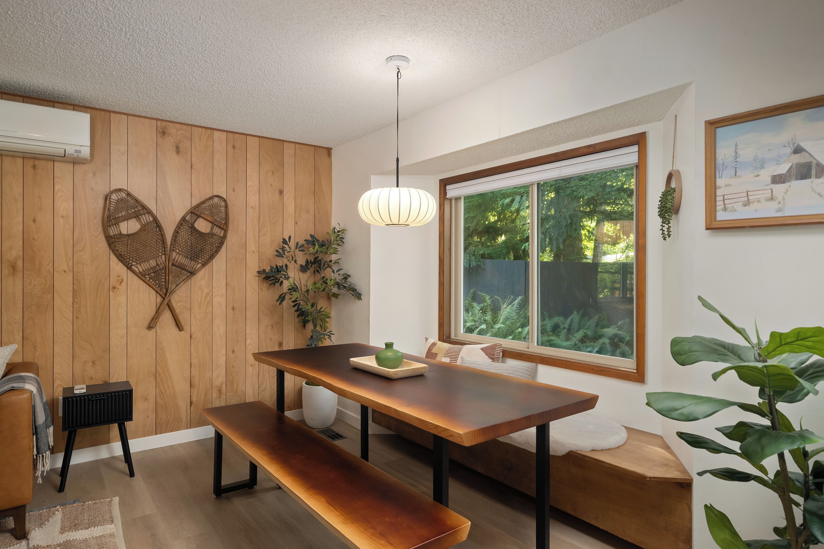 Warm lantern light and forest views make every meal here feel special.