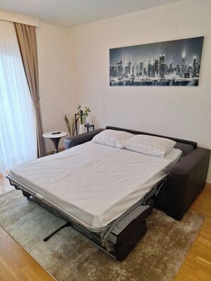 1 habitación, tabla de planchar con plancha, wifi y ropa de cama 