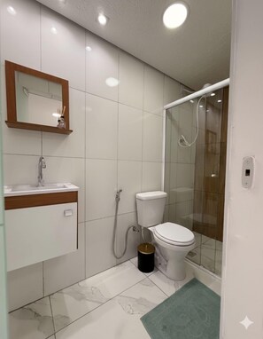 Shower, towels, soap, toilet paper