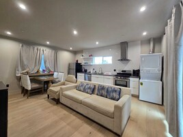 Apartment, 5 Bedrooms | Living area | 55-inch Smart TV with digital channels, Netflix, streaming services
