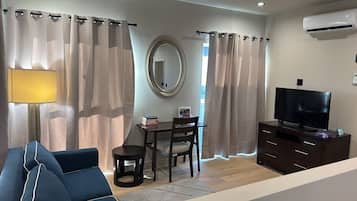 Apartment, 4 Bedrooms | Living area | 55-inch Smart TV with digital channels, Netflix, streaming services