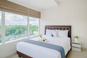 Standard Apartment - Comfy and Spacious 3BR with Extra Room Grand Kamala Lagoon Apartment By Travelio   (Bekasi)