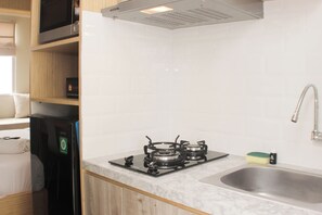 Standard Studio | Private kitchen - Fully Furnished And Tidy Studio At Grand Kamala Lagoon Apartment (Bekasi)