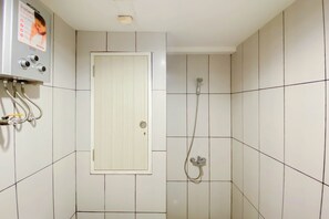 Standard Studio | Bathroom - Comfort And Homey Studio Grand Kamala Lagoon Apartment (Bekasi)