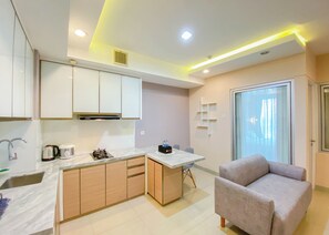 Living room - Homey And Well Furnished 2Br Grand Kamala Lagoon Apartment (Bekasi)