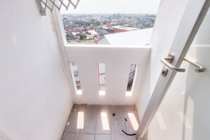 Standard Studio | Balcony view - Simply Homey Studio Room Urbantown Serpong Apartment (South Tangerang)
