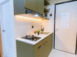 Interior - Compact Wood Accents Studio Apartment Grand Kamala Lagoon (Bekasi)
