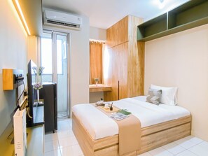 Standard Studio - Compact Wood Accents Studio Apartment Grand Kamala Lagoon (Bekasi)