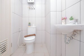 Standard Apartment | Bathroom - Studio Near Gunadarma University Bekasi At Grand Kamala Lagoon Apartment (Bekasi)