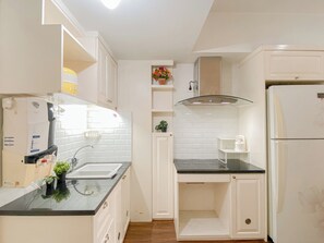 Standard Apartment | Private kitchen - Warm And Homey 2Br Apartment Springlake Summarecon Bekasi (Bekasi)