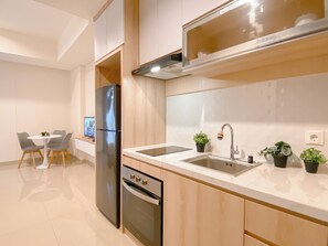 Standard Studio | Private kitchen - Cozy And Neat Studio At Cleon Park Apartment (Jakarta)