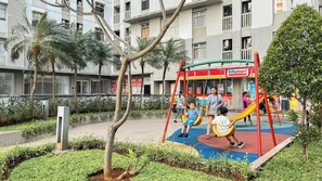 Children's play area - outdoor - Warm And Comfy 2Br At Green Bay Pluit Apartment (Jakarta)