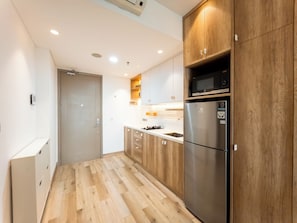 Private kitchen - Warm And Spacious 2Br At Gold Coast Apartment (Jakarta)