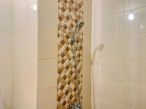 Standard Studio | Bathroom - Neat And Compact Studio At Dave Apartment (Depok)