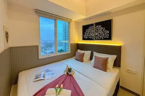 Interior - Contemporary Cozy 2Br With Direct Access To Mall At Tanglin Supermall Mansion Apartment (Surabaya)