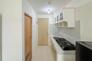 Standard Studio | Private kitchen - Adequate And Comfortable Studio At Bale Hinggil Apartment (Surabaya)