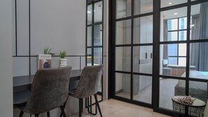 Dining room - Urban Grey 1Br At Sudirman Suites Apartment (Jakarta)