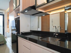 Interior - Modern Brown Toned Studio At Ciputra World 2 Apartment (Jakarta)