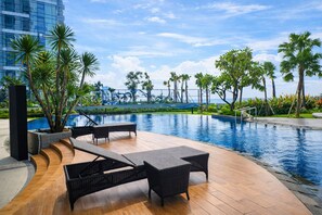 Outdoor pool - Comfortable And Roomy Studio At Tanglin Supermall Mansion Apartment (Surabaya)