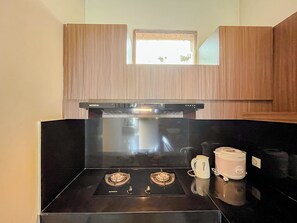Standard Studio | Private kitchen - Comfortable And Pleasant Studio At Villa Casa De Uli (Jimbaran)