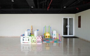 Children’s play area – indoor - Wood Accents Studio At Grand Dharmahusada Lagoon Apartment (Surabaya)