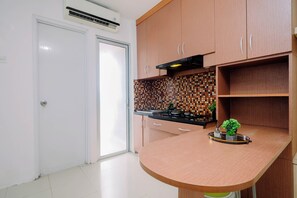 Standard Apartment | Dining room - Serene And Warm 2Br At Apartment Bassura City (Jakarta)