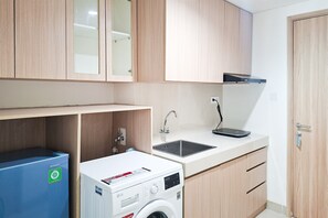Standard Studio | Private kitchen - Wooden Accents 1Br Without Living Room At Bintaro Embarcadero Apartment (South Tangerang)