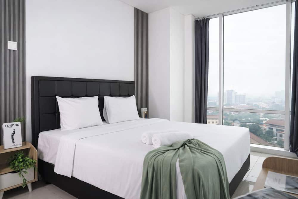 2Br Apartment With Service Room And Sofa Bed At Woodland Park Residence