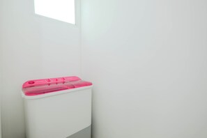 Standard Apartment | Laundry - 2Br Apartment With Service Room And Sofa Bed At Woodland Park Residence (Jakarta)