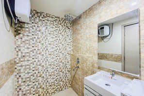 Standard Studio | Bathroom - Cozy And Modern Studio At Mataram City Apartment (Ngaglik)