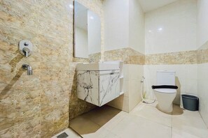 Standard Studio | Bathroom - Cozy And Modern Studio At Mataram City Apartment (Ngaglik)