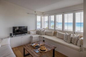 Superior appartement, uitzicht op zee | Woonruimte