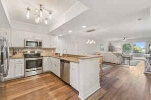 Fridge, microwave, oven, stovetop - "Passing Time" Condo Retreat | 3 Beds | 2 Baths | Slps 7 | Resort Amenities | Steps to the Beach (New Smyrna Beach)