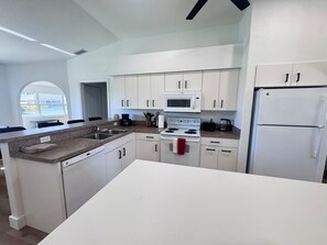 Fridge, microwave, oven, stovetop - Canal-Front Rotonda West Retreat, Water Views 3BR/2BA (Rotonda West)