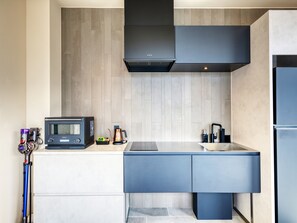 Junior Suite, Balcony, Ocean View | Private kitchen | Full-size fridge, oven, stovetop, electric kettle - KANDOR RESORT OKINAWA (Nakijin)