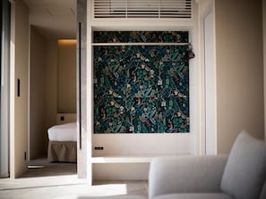 Ocean Infinity Suite | Living area | 55-inch flat-screen TV with digital channels - KANDOR RESORT OKINAWA (Nakijin)