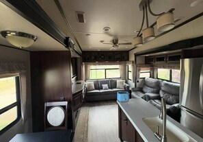 TV, fireplace - The Columbus w/ Spa Access (Stettler)