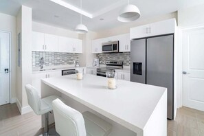 Fridge, microwave, oven, stovetop - Romantic Island Retreat | Resort Pool & Sunset Rooftop (Battaleys)