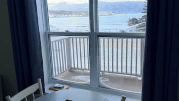 Apartamento, 1 cama King, cozinha americana, vista para o oceano | Opções para refeição