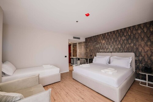 Ermes Deluxe Triple Room With Balcony and Sofa Bed