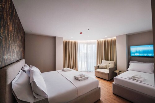 Ermes Deluxe Triple Room With Balcony and Sofa Bed