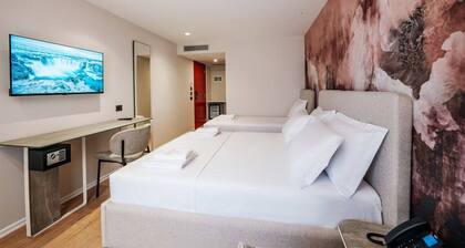 Ermes Deluxe Triple Room With Sofa Bed