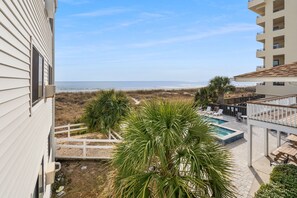 Terrace/patio - Cozy side-view ocean condo with balcony, pool access, and easy beachside living (North Myrtle Beach)